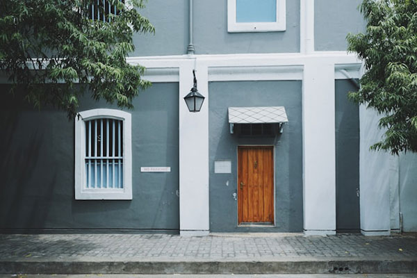 Building with closed wooden door